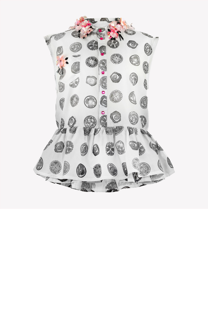 Hand printed peplum shirt with floral embellishment
