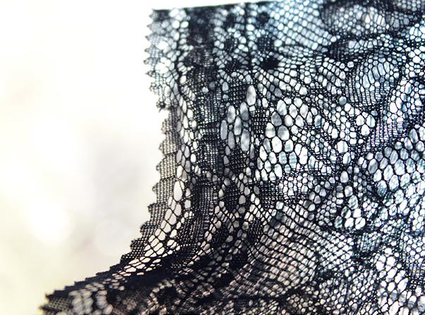 Lace dress with sequins and artificial flowers