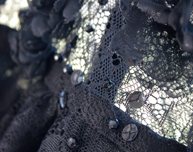 Lace dress with sequins and artificial flowers