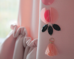 Scuba jumper with tassel embellishment and ruffles