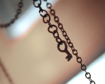 Long statement necklace with lace flower and leather tassel