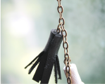 Leatherette tassels necklace in black and white